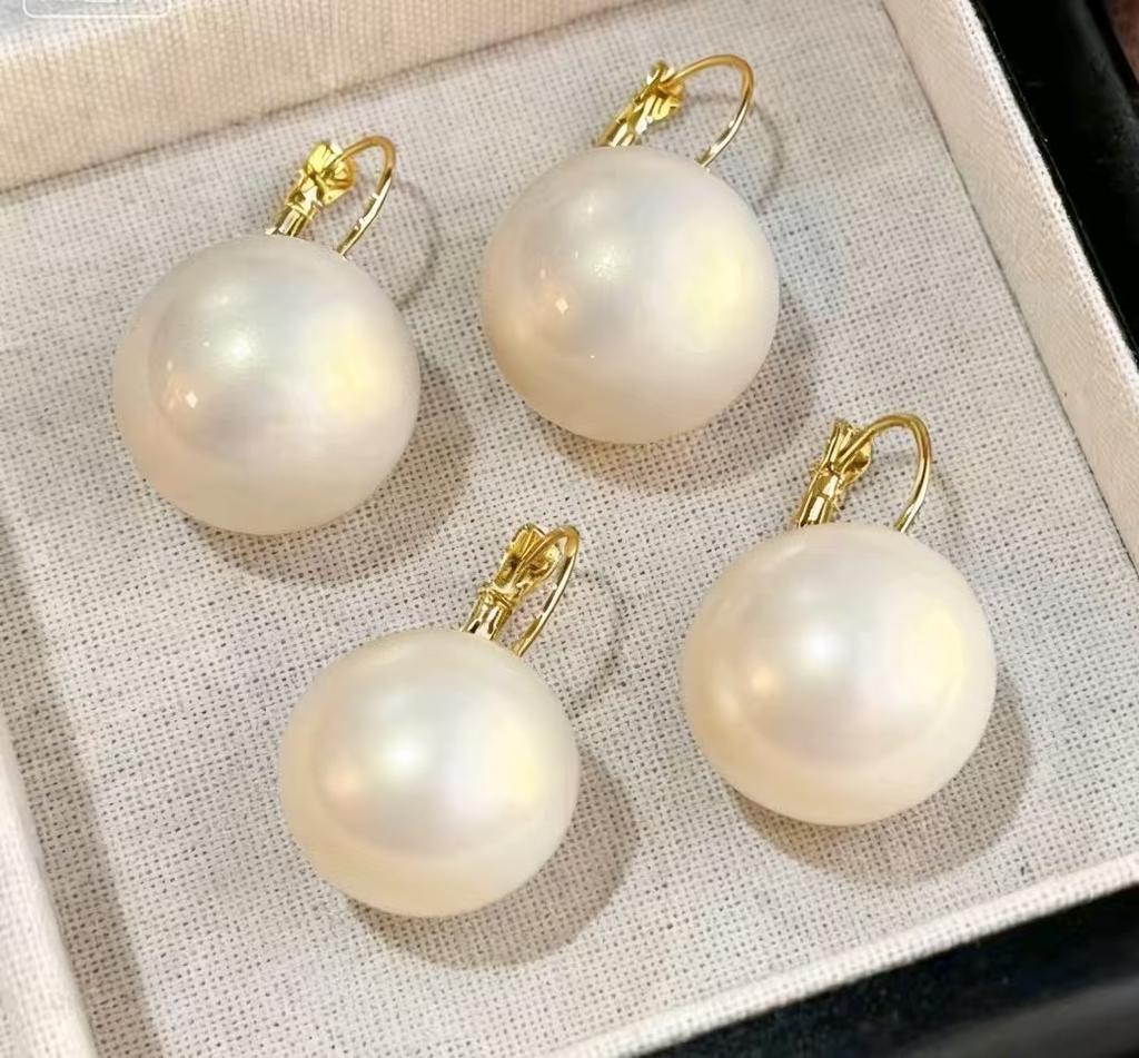 Hong Kong style elegant temperament pearl earrings women's ear buckle type niche unique design earrings European and American cold wind earrings