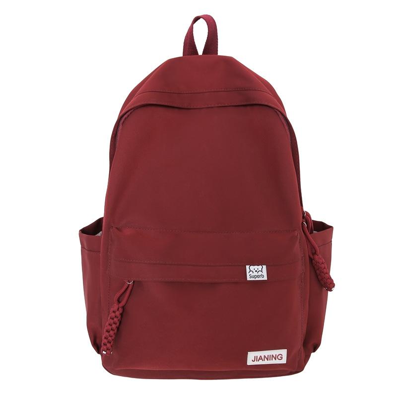 Schoolbag New Men's Casual Schoolbag Solid Color School Large Capacity Female Student Backpack Junior High School College Student Nylon Backpack