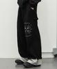 GAKKAI UNIONS One-Pleat Crystal Roll-Up Sweatpants Black