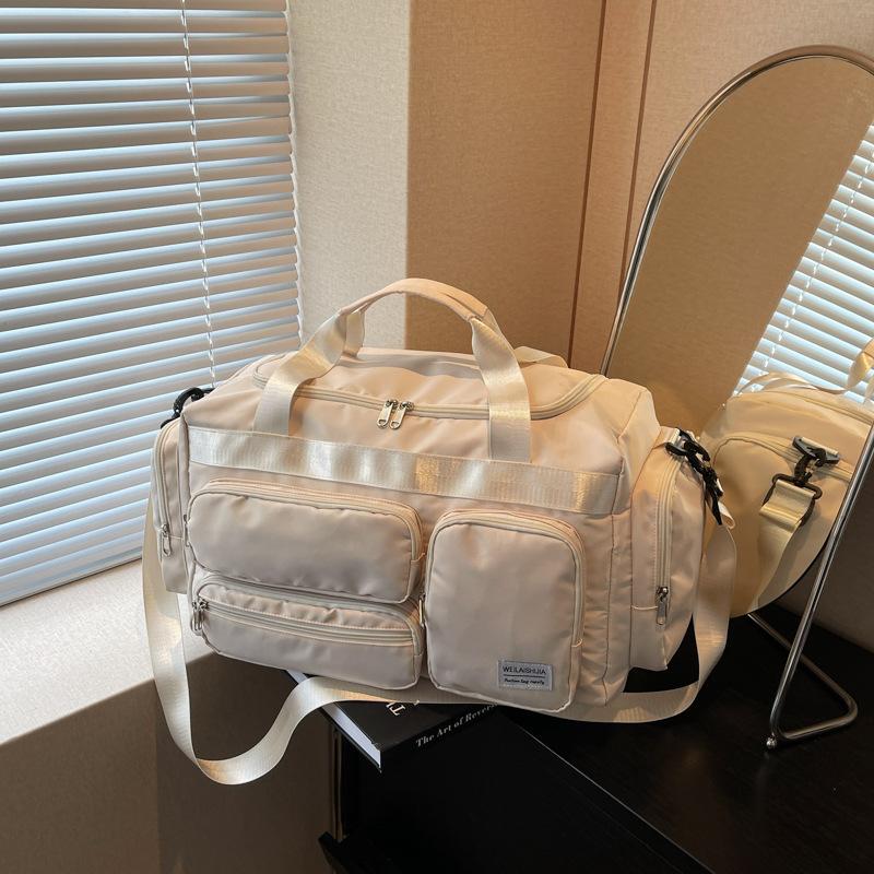 

Large capacity luggage bag versatile short trip bag women s new wet and dry separation shoulder messenger bag покинуть белый