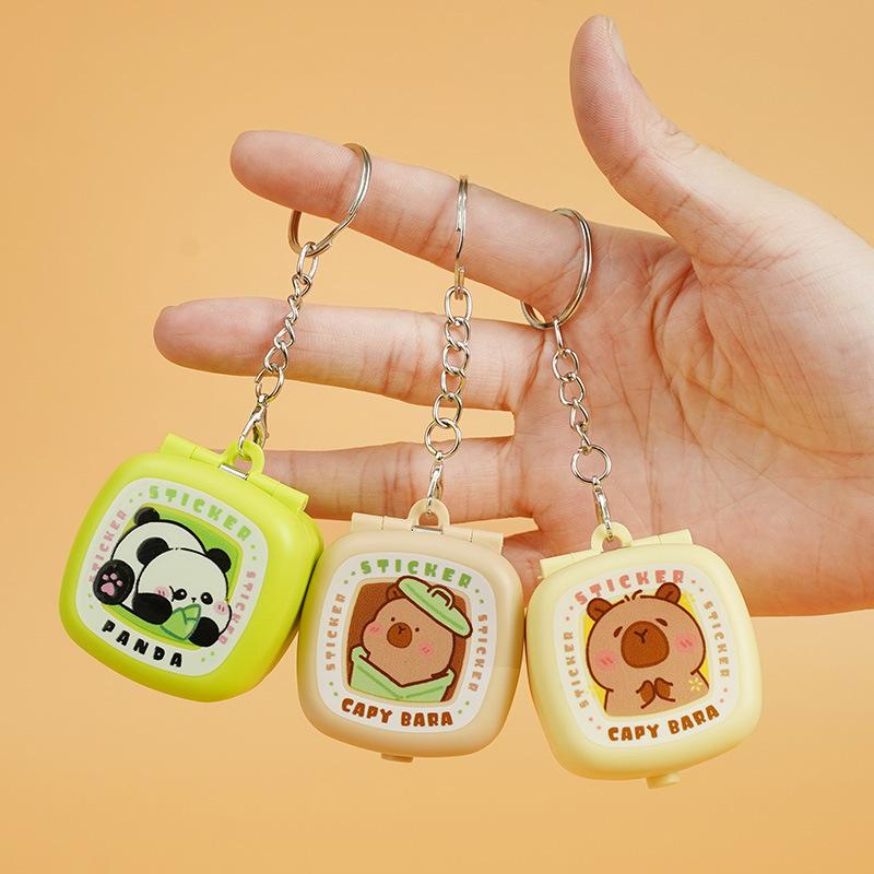 Mini Macchina Creativa per Adesivi Scatola Sorpresa Giocattoli Decompressione Portachiavi Divertente Macchina Rotante per Adesivi Ciondolo Zaino Regalo Ragazza