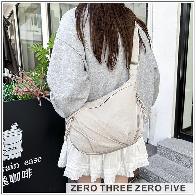 Autumn and winter nylon women's shoulder dumpling bag 2025 popular foreign-style messenger bag fashionable versatile mobile phone bag