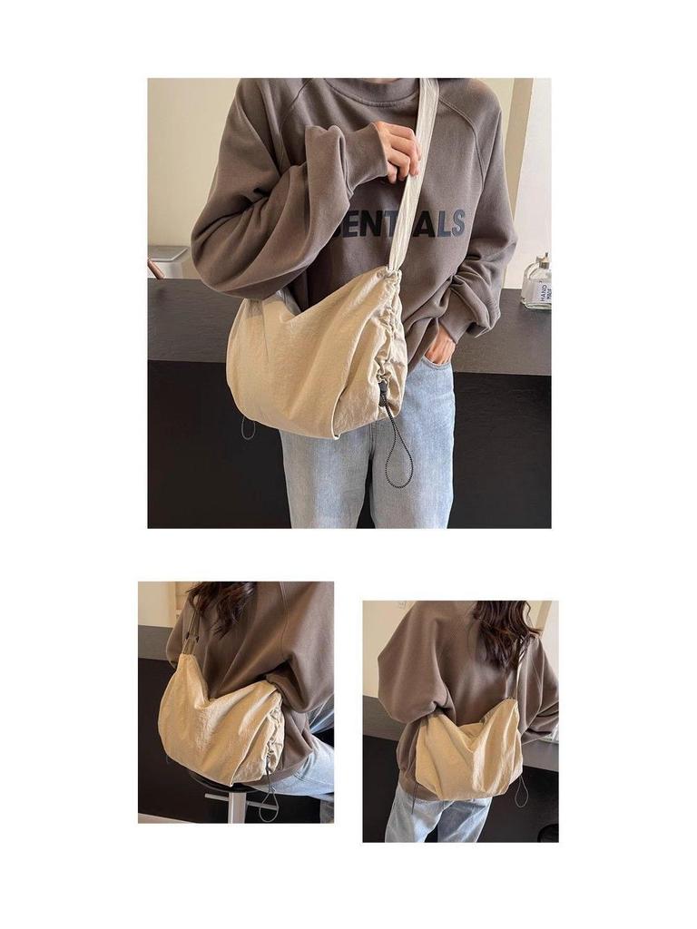 Japanese-Style Waterproof Nylon Dumpling Crossbody Bag: Sporty, Large-Capacity Tote for Men & Women, Ideal for Cycling & Relaxed Shoulder Wear.