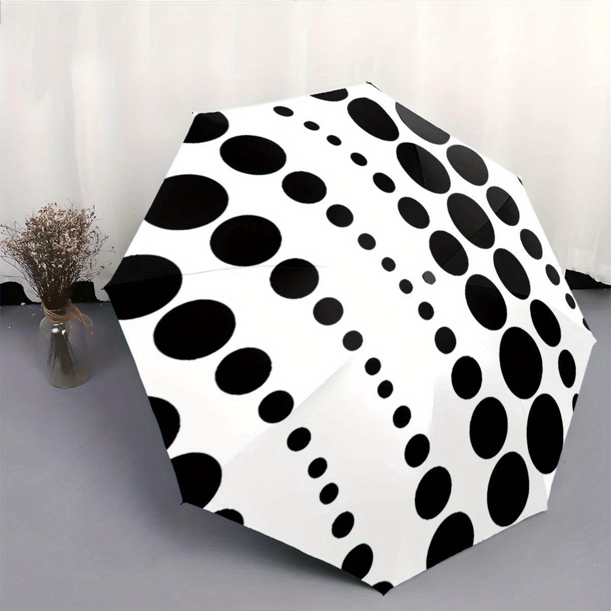

This Is a Portable Automatic Folding Umbrella Featuring Black Polka Dots on a White Backdrop. It S a Convenient Accessory for Iron&8K