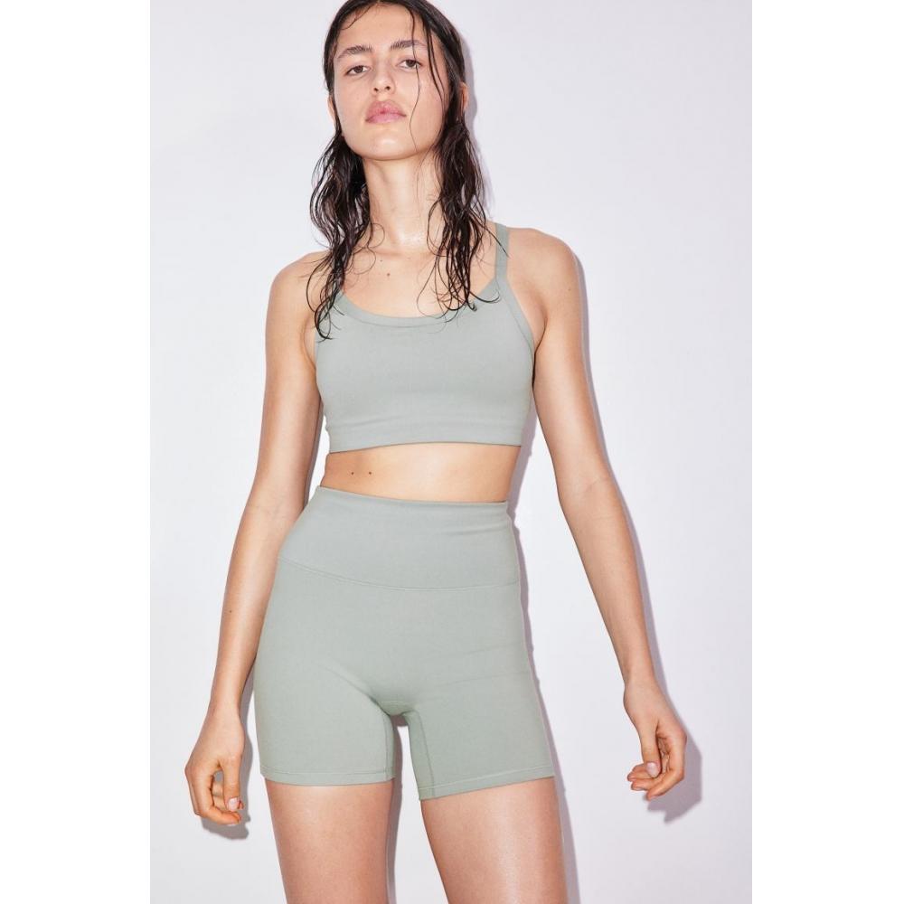 

Спортивный бюстгальтер средней поддержки HM DryMove Светло-хаки-зеленый