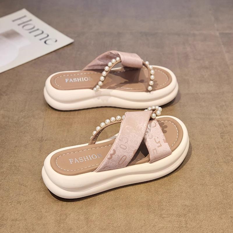 

Однословные шлепанцы на мягкой подошве 2025 лето универсальные нишевые на платформе маффин, увеличивающие рост, пляжная обувь, крутые шлепанцы 40 розовый