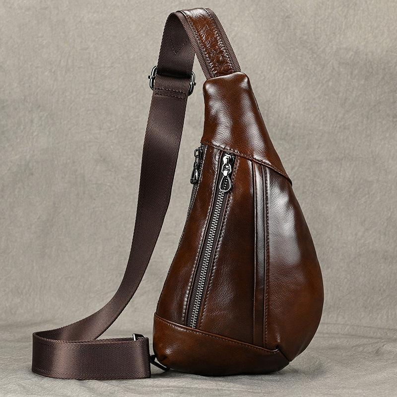 Creative fashion breast bag men's leather shoulder bag messenger bag first layer cowhide retro men's bag