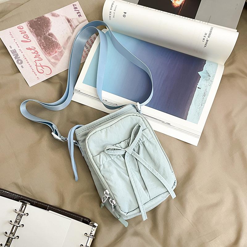 

2025 new lightweight bow bundle messenger bag large capacity mobile phone bag umbrella kettle bag women s shoulder bag 16*6*22