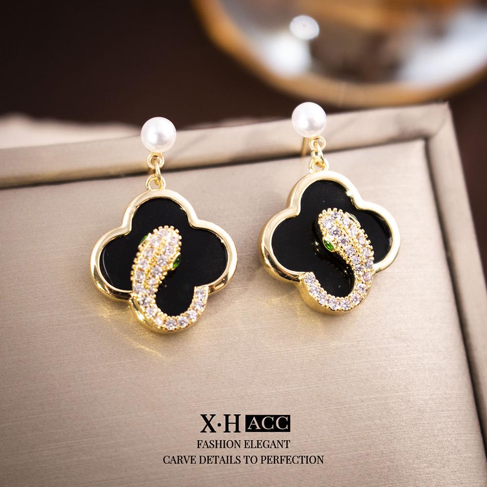 Elegant Gold-Plated Black Zircon Stud Earrings - Niche Design for a Luxurious Fashion Statement