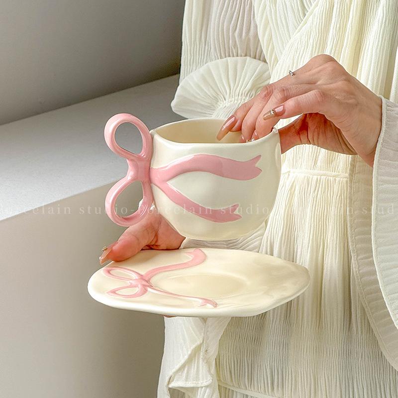 

Bow Shaped Ceramic Coffee Cups and Plates Water Cup Milk Mug Home Breakfast Cup Flower Tea Cups Afternoon Tea Mug Coffee Mugs 201-300ml