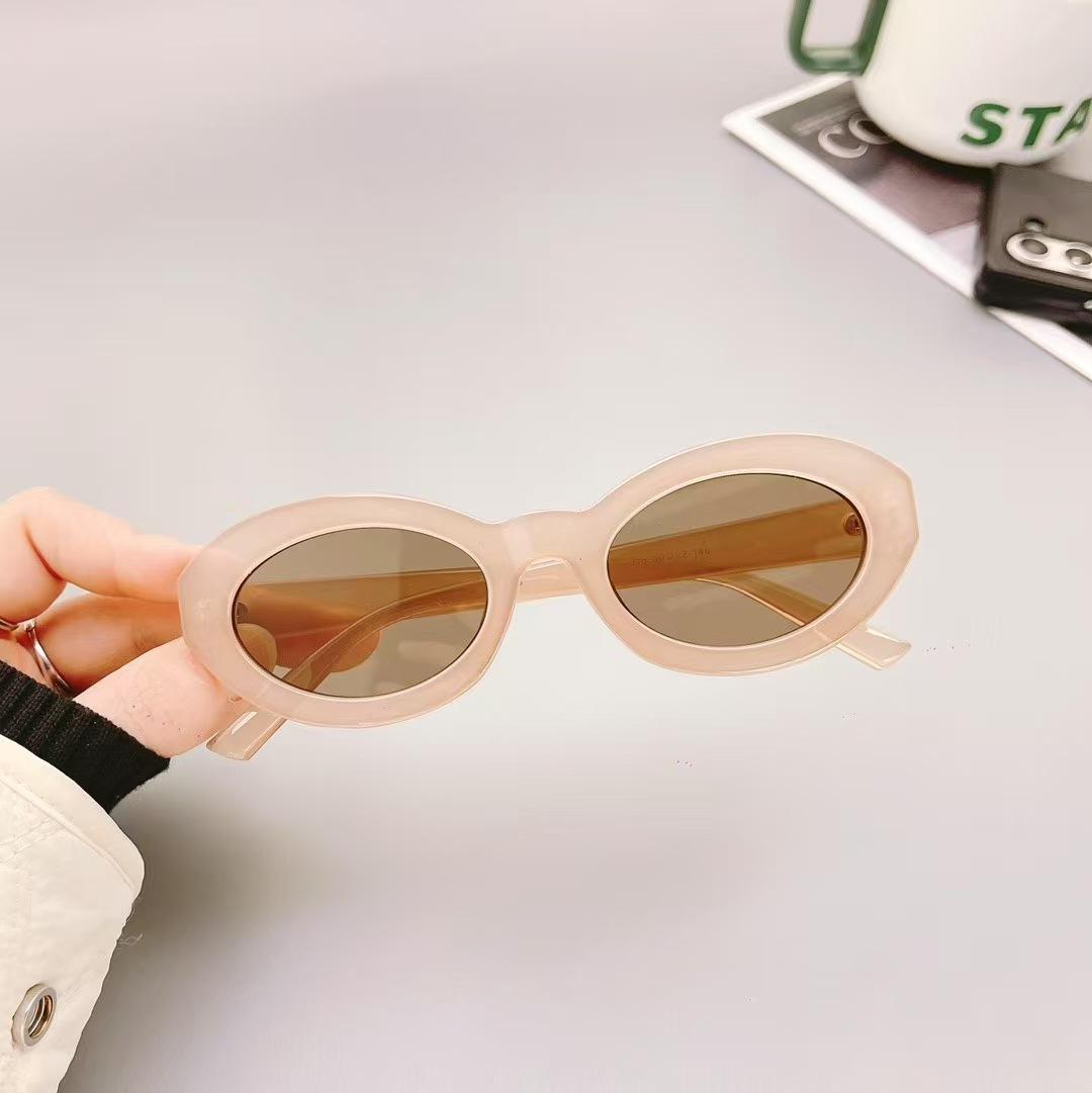 

Oval Shaped Shape Sun Glasses For Women Stylish Stylish UV 400 Protection Protection Sun Glasses Man Holiday Travelling Designer Style Sun Glasses