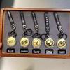 Gold 999 Pure Car Logo Pendant Keychain - New TikTok Trend Father's Day Gift