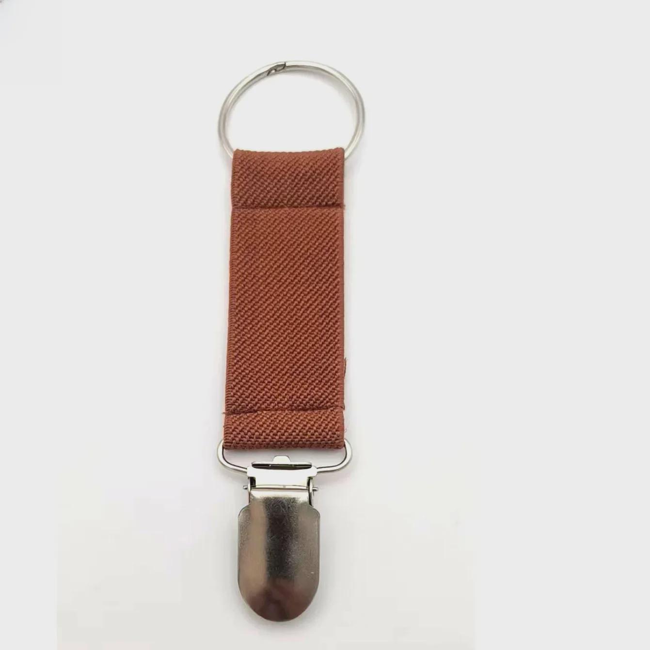 

Модернизированный многофункциональный эластичный зажим для шапки и перчаток для детей