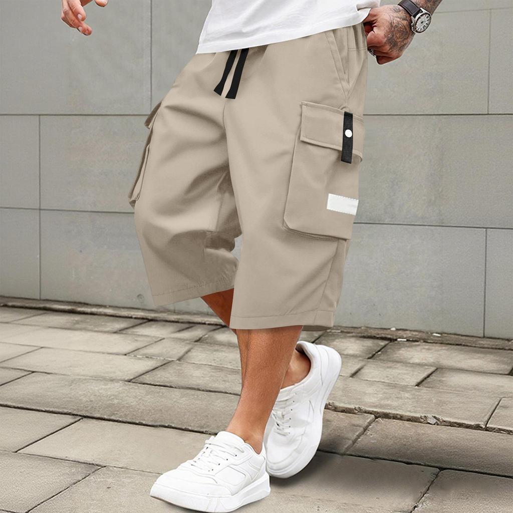 Men's casual and fashionable lace-up lightweight and breathable sports shorts. Men's loose and large-sized multi-pocket workwear shorts.