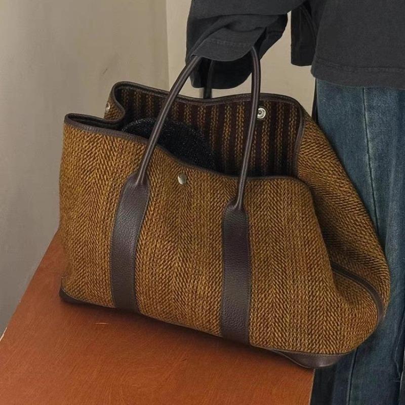 Niche designer autumn and winter new women s bag fashion temperament woolen shoulder portable large bag simple versatile backpack