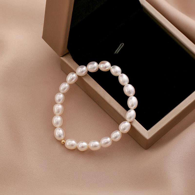 Rice Grain Freshwater Pearl Bracelet Temperament Niche Design Fashionable And Simple 18K Gold Electroplating Bracelet Elastic Adjustable