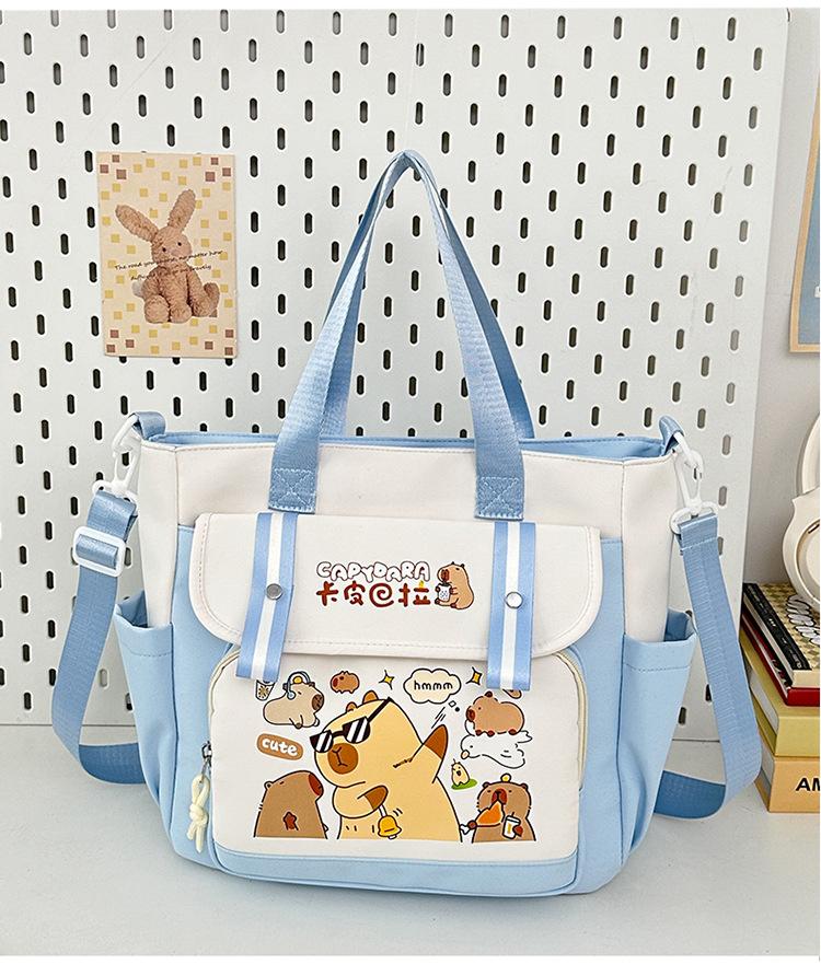 School bag 2025 new large-capacity cartoon multi-compartment high-value school bag Korean version commuting simple make-up bag lightweight backpack