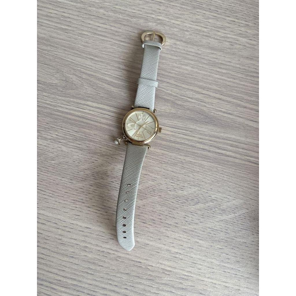 Used Vivienne Westwood white wristwatch with chaRM, in box, working condition