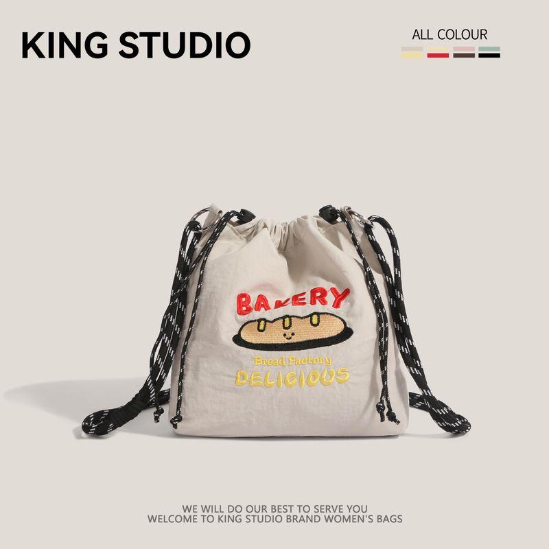 

Nylon Embroidered Canvas Small Bag Women 2025 New Summer Drawstring Shoulder Messenger Bag Simple Portable Mobile Phone Bag Gray