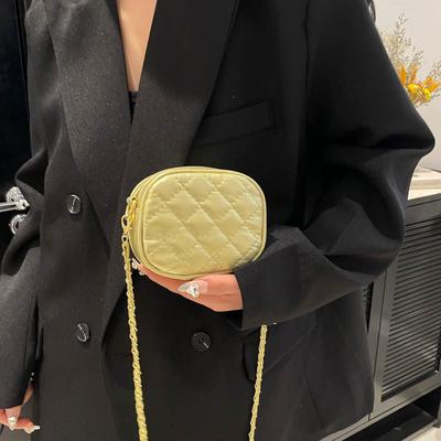 Bolsa de telemóvel com corrente de losango texturizada novo design de nicho bolsa de muda de roupa temperamento elegante bolsa redonda transversal a ombro