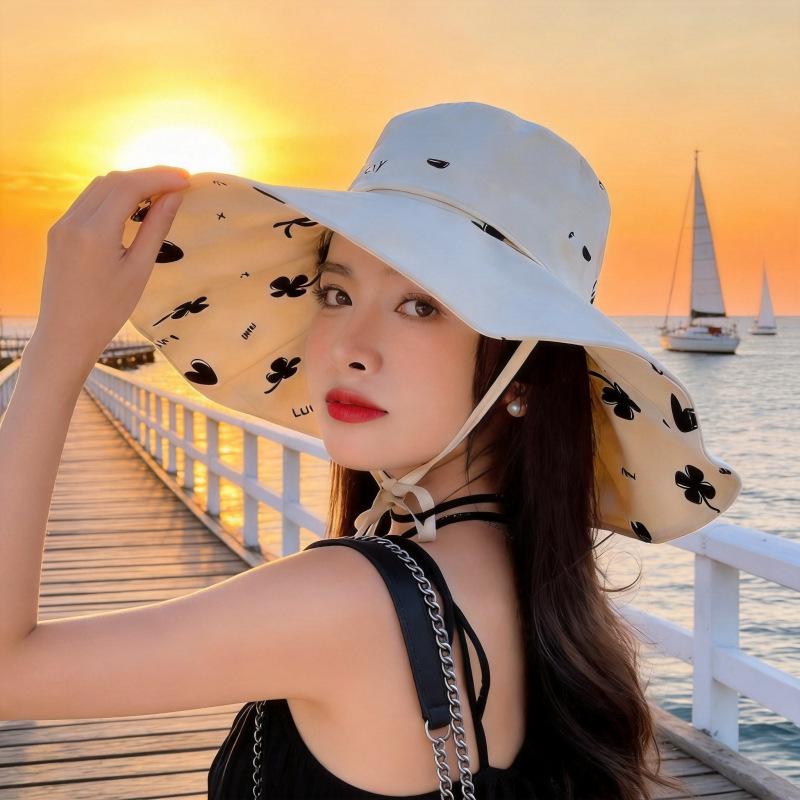 Summer seaside beach sun hat versatile outdoor big eaves bucket hat women's cotton and linen double-sided can wear four seasons sun protection hat