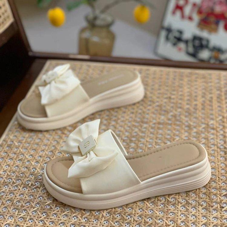 Internet celebrity platform slippers 2025 women's summer new outer wear fashion non-slip heightening bow summer versatile word