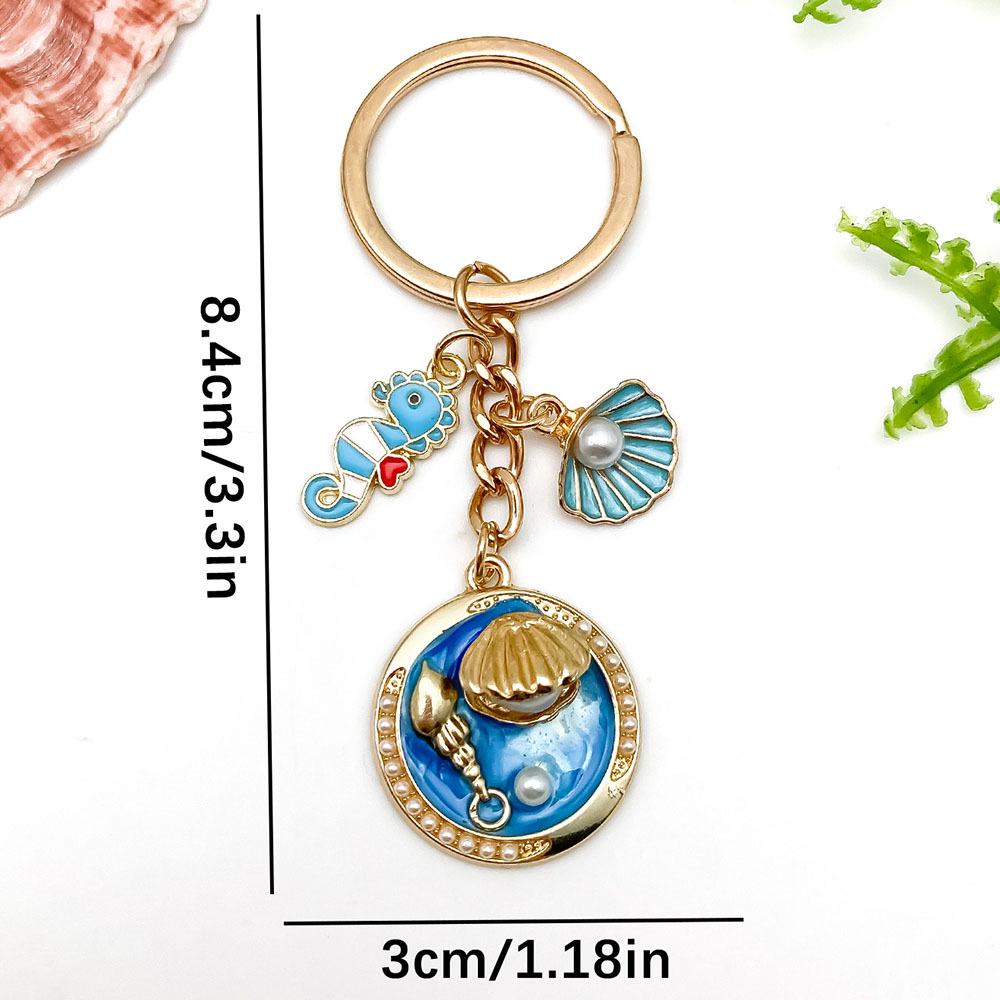 Ocean Drip Keychain: Green Starfish, Conch, Faux Pearl, Round Tag, Alloy Pendant