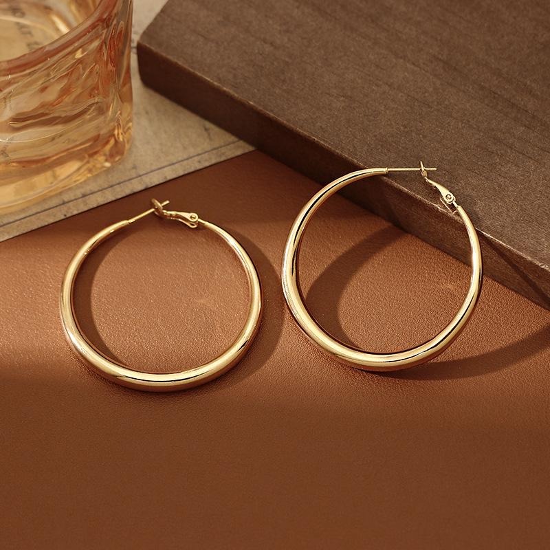 2025 Gold Large Hoop Earrings: Luxury Niche Design Studs for Women, Ideal for Round Faces