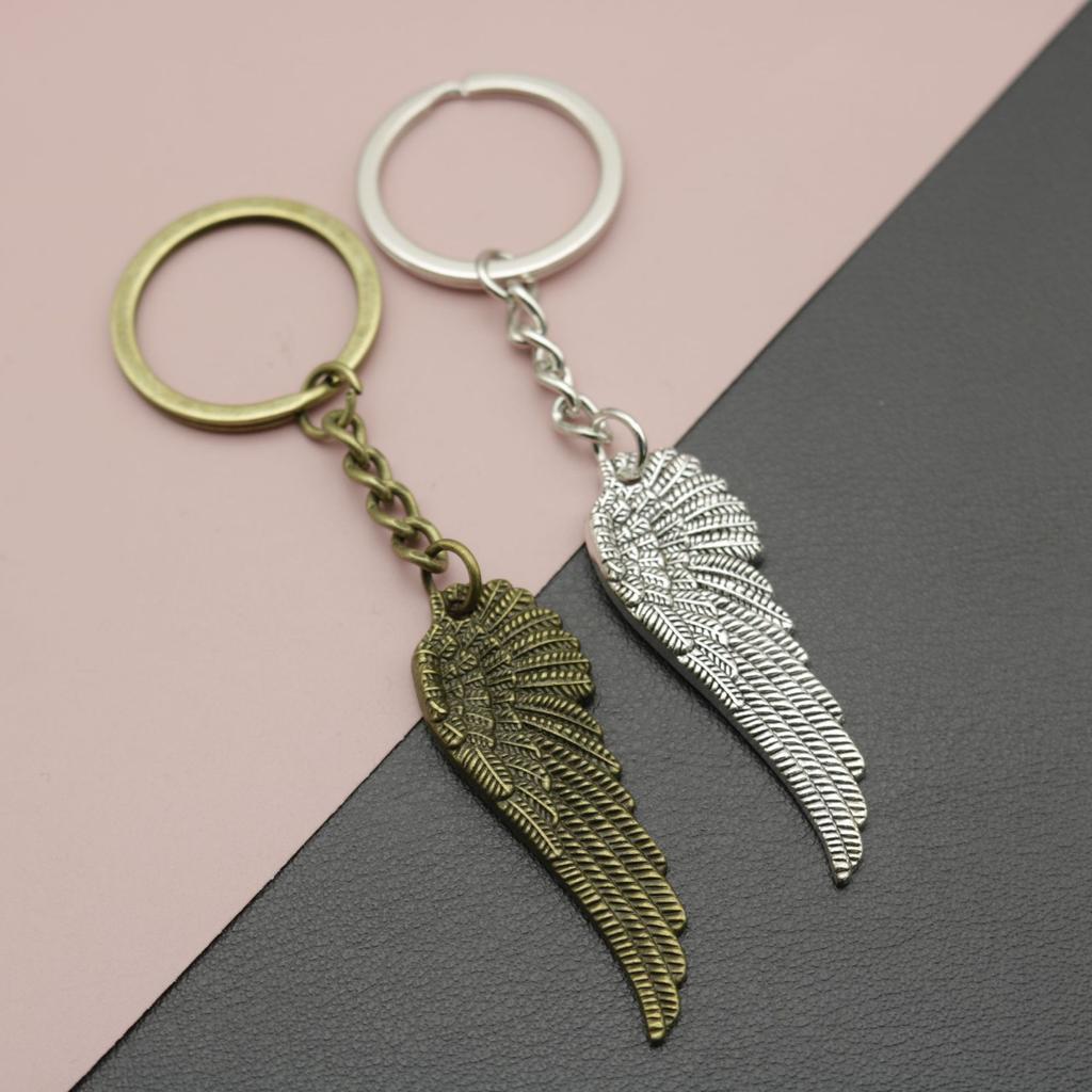 Schmuck, Minimalistischer Feder-Schlüsselanhänger-Anhänger