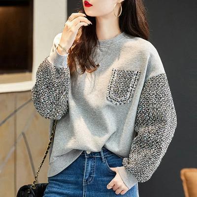 Dames trui met lange mouwen, ronde hals en losse pasvorm voor de lente en herfst, met een eigenzinnig design.