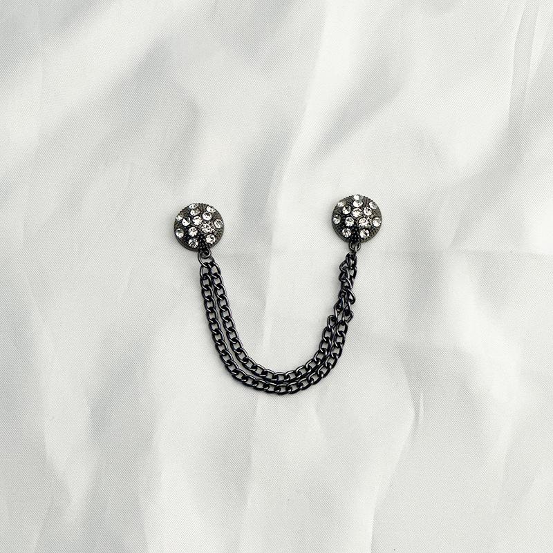 

Магнітна пряжка для вкорочення штанини та захисту від підмітання