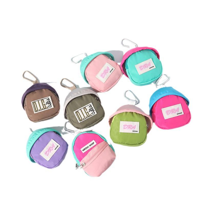 Mini Portable Candy Color Backpack Pendant: Mobile Phone, Earphone, Coin, and Key Storage Bag.
