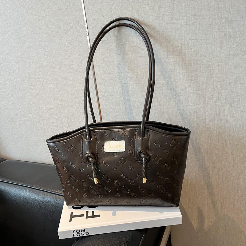 

Premium sense retro niche embossed bag women s 2025 new commuter versatile shoulder underarm bag portable tote bag