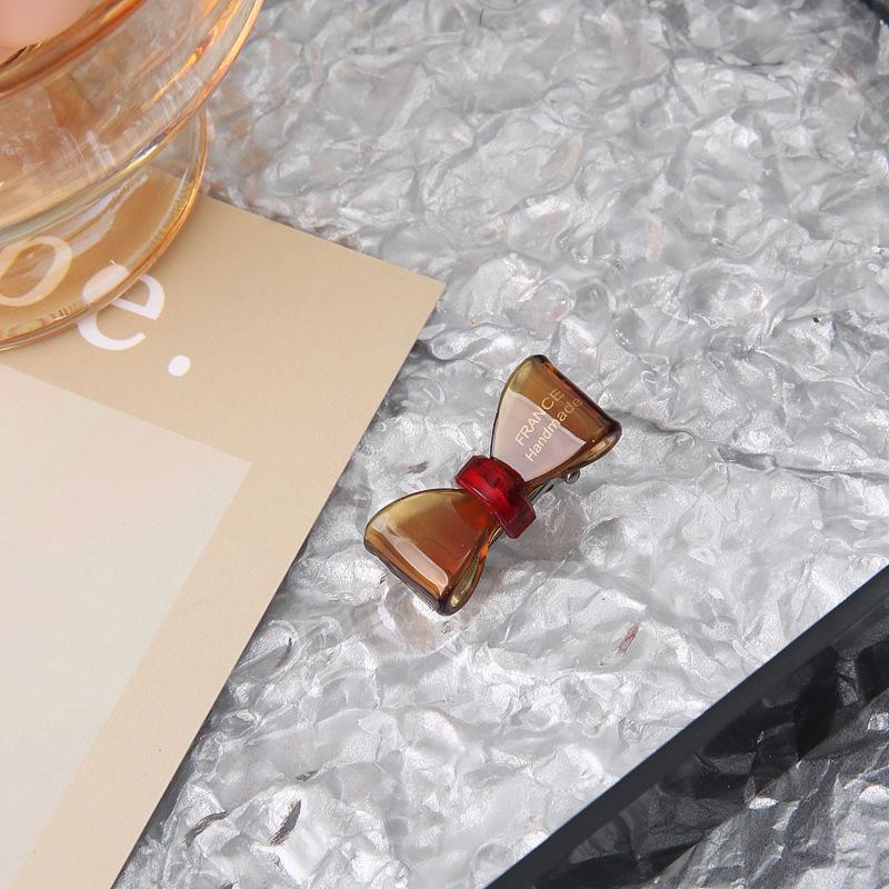 

Золотая ацетатная заколка-бант для волос – Элегантная заколка для девочек