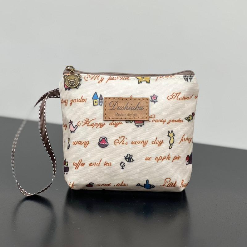 

The new Korean version waterproof small change bag, power bank, earphone card bag, aunt towel bag, makeup mouth red envelope storage small bag.