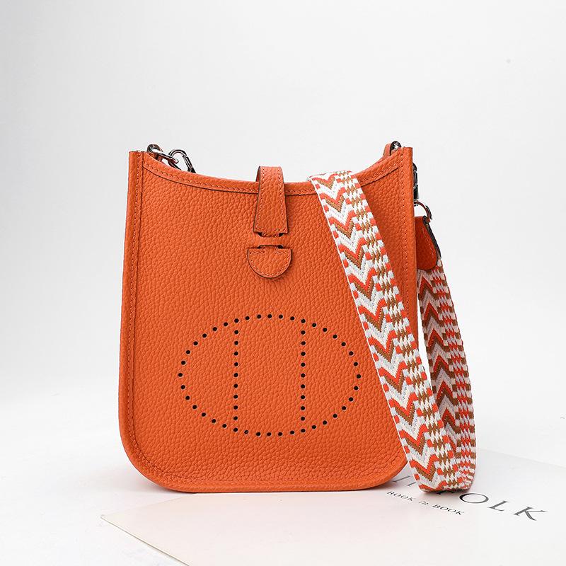 Factory wholesale first layer togo cowhide bucket bag women's bag lychee pattern hollow single shoulder crossbody bag hollow design