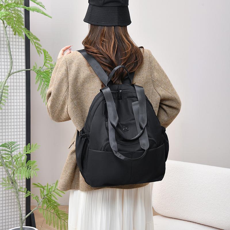 Fashionable Lightweight Backpack with Multiple Carrying Styles and Spacious Compartments for Daily Use