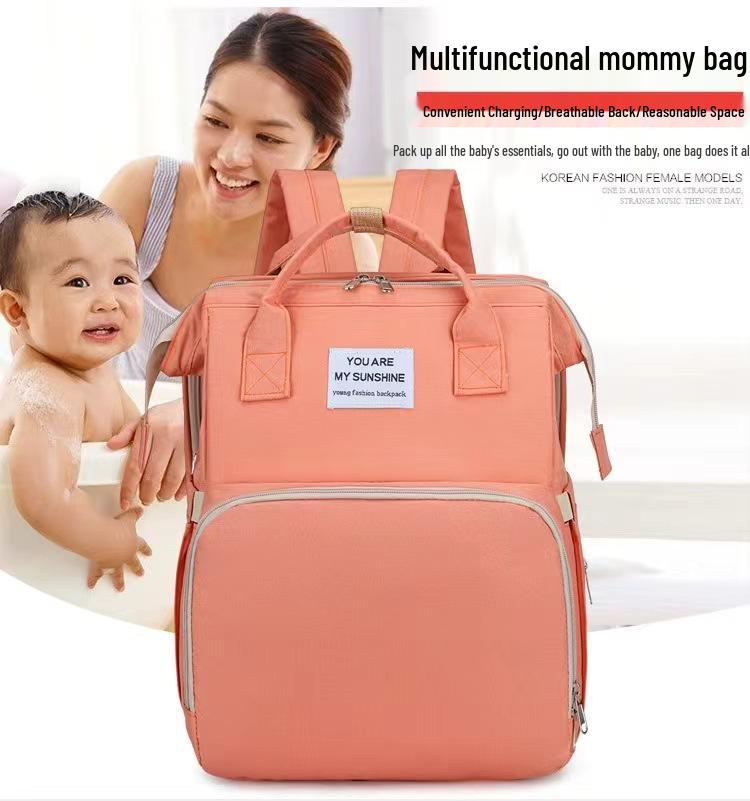 Portable Folding Mummy Bag: Lightweight, Large-Capacity Mother & Baby Backpack with Multi-purpose Bed Feature.