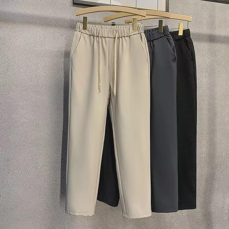 Pánské jarní/letní slim fit devítibodové ležérní oblekové kalhoty s elastickým pasem - korejský styl