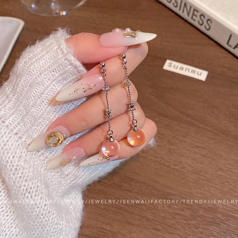 Explosive clear white crystal ball fringed earrings women s niche design sense long stud earrings gentle earrings