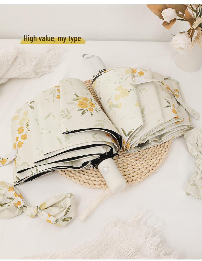 Compact Dual-Purpose Umbrella, UV Protection Parasol with Black Coating, Yellow Floral Design for Sun and Rain