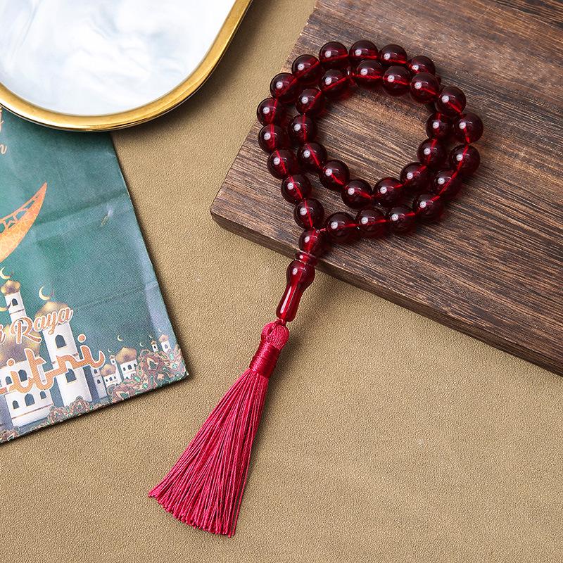 Handgefertigtes grenzüberschreitendes 33-Perlen-Quastenarmband - Gebetsperlen aus Korallimitat