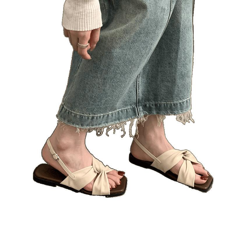 Flat-soled sandals women's summer wear new versatile French beautiful fairy style with skirt travel seaside Roman shoes