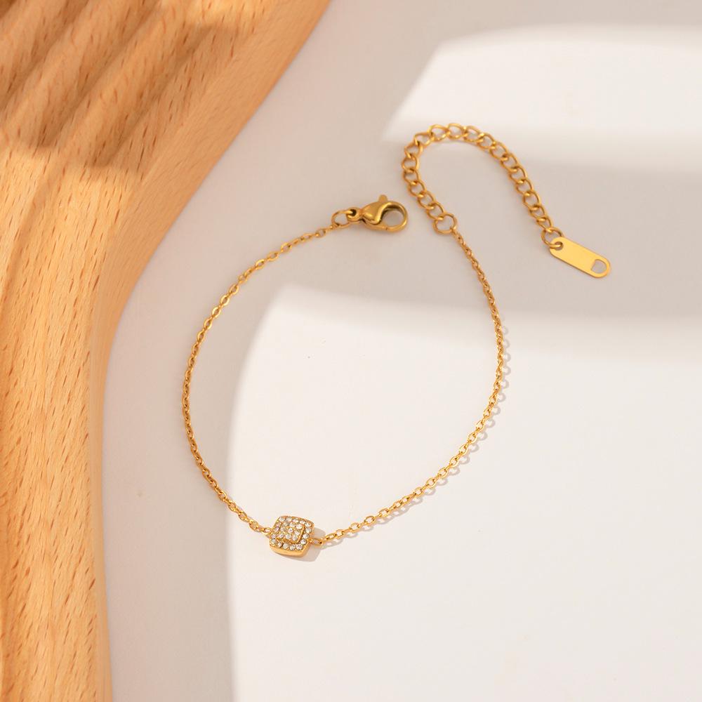 Retro Hong Kong-Inspired Exquisite Women's Bracelet: 18K Gold Titanium Steel with Zircon Square Pendant Beads.