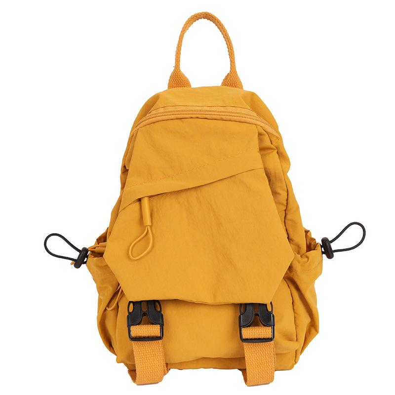 

2025 new backpack women s large-capacity Japanese simple leisure small travel backpack trendy college student schoolbag жёлтый