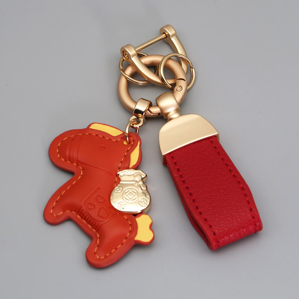 Kleiner Schaf- & Pferdeleder-Schlüsselanhänger mit Perlenanhänger - Gold