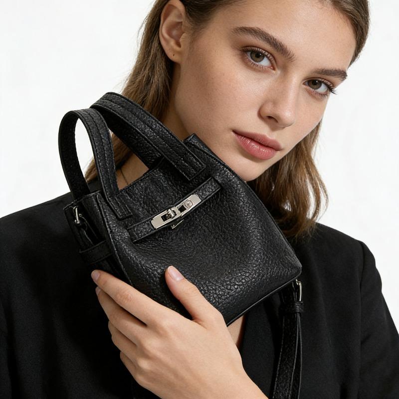 Simple commuter handbag bag female, new niche design lychee pattern messenger bag light luxury versatile bucket bag