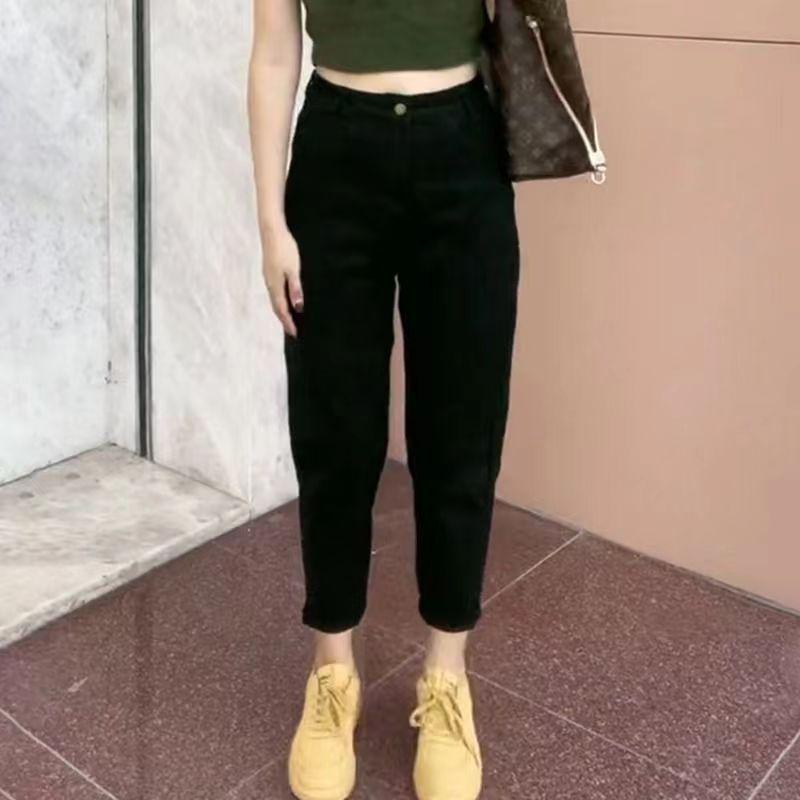Dámské úzké černé devítibodové harémové mrkvové džíny na jaro a podzim 2024