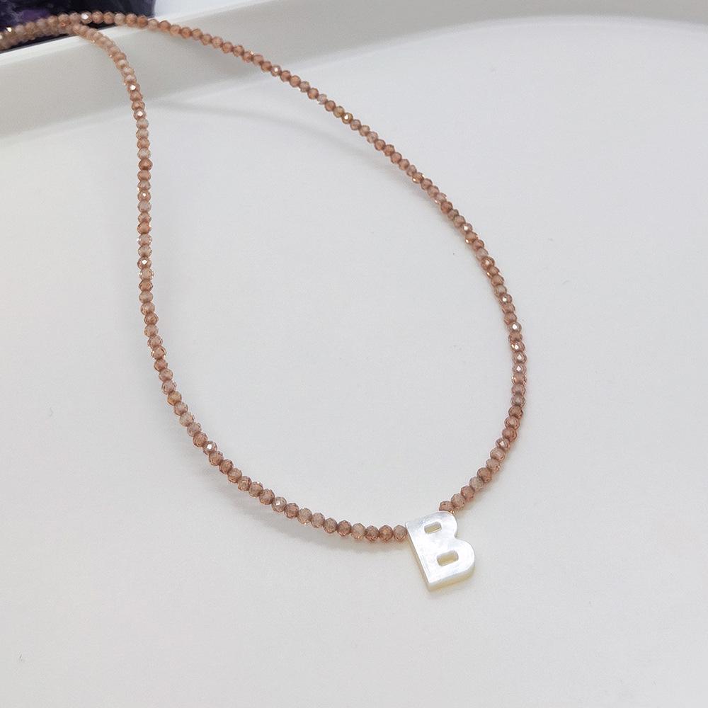 Elegant 2m Zircon Beaded Clavicle Chain: 26-Letter Deep Sea Shell Necklace for Women.