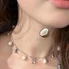 Empress Dowager Baroque Tassel Pearl Necklace - Women's Fashion Statement